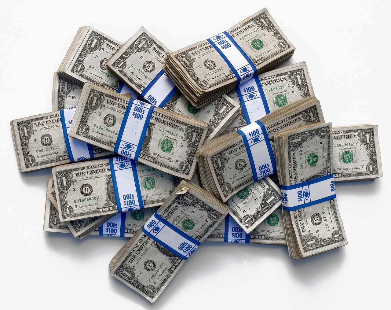 Bundles of US dollar cash representing increased cash allocation and portfolio stability in an investment strategy